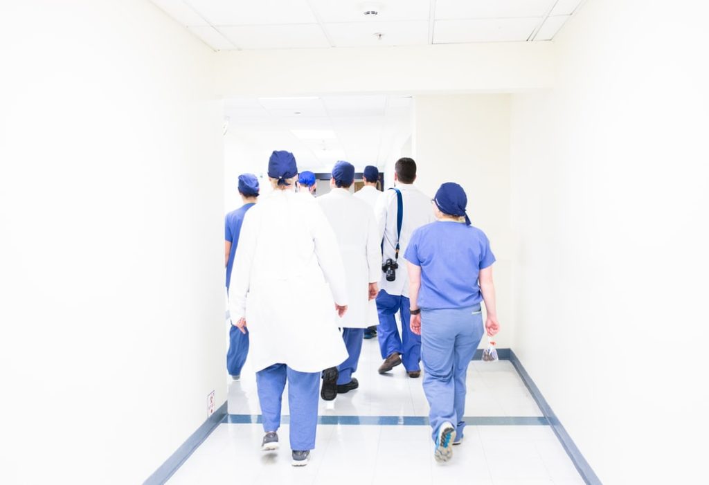 group of medical students going to their clinical work