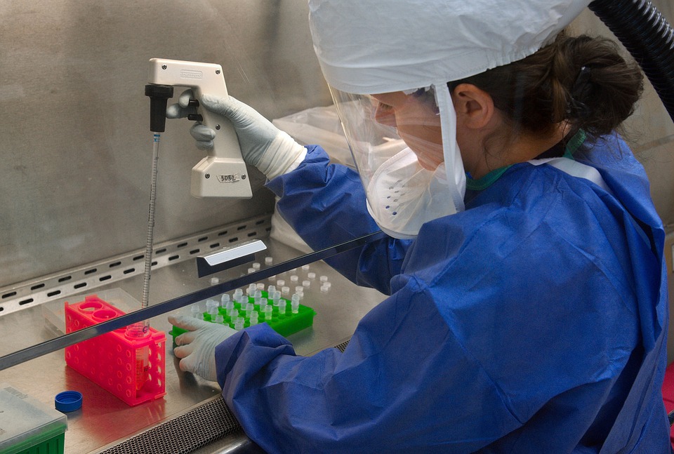 medical scientist handling dangerous biological samples
