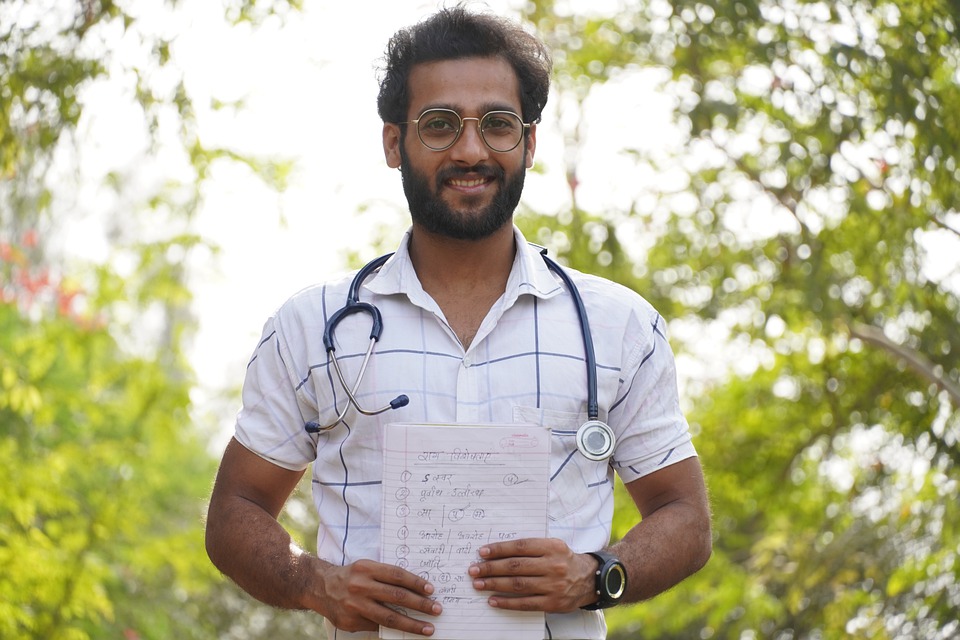 physician holding list of career ideas