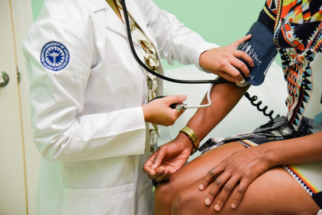 resident doctor checking on patient